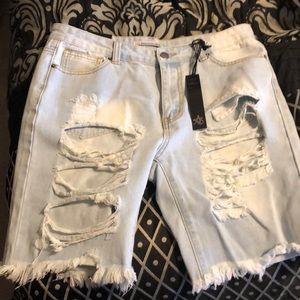 Brand new distressed denim shorts